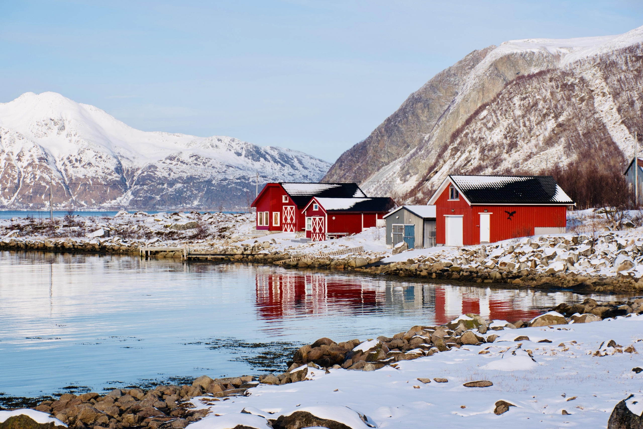 Red cabins by the water