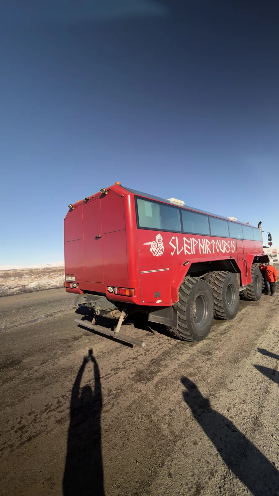 Glacier Snowmobiling — A red tour vehicle used for the Langjökull snowmobile outing